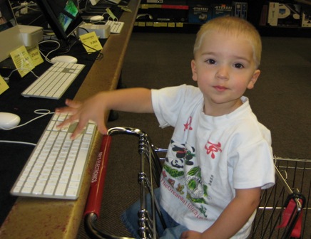 Zach on a  Mac at Fry's