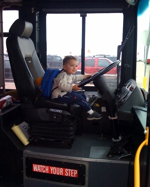 Zach driving a bus